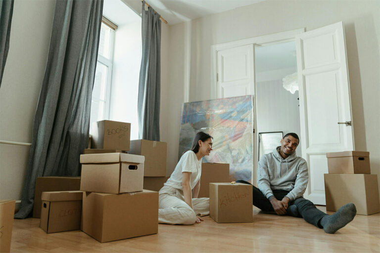 Cardboard boxes covering living room space