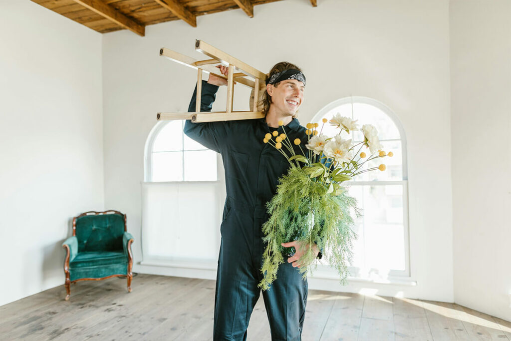 A mover carrying items in a new home