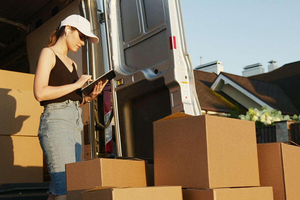 A woman checking the packing list